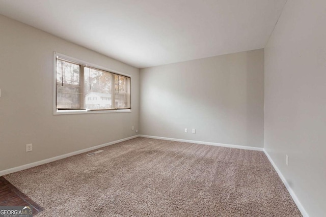 view of carpeted spare room