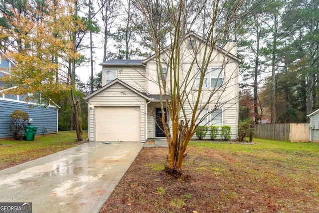 view of front property with a garage and a front lawn