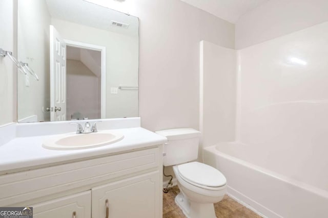 full bathroom featuring tile patterned floors, vanity, shower / bath combination, and toilet