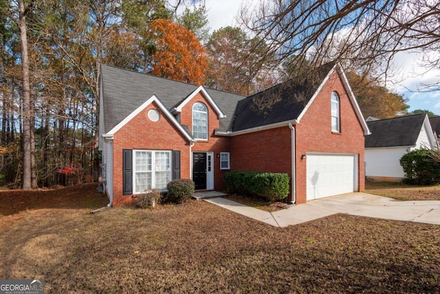 front of property with a garage