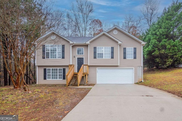 split foyer home featuring a garage