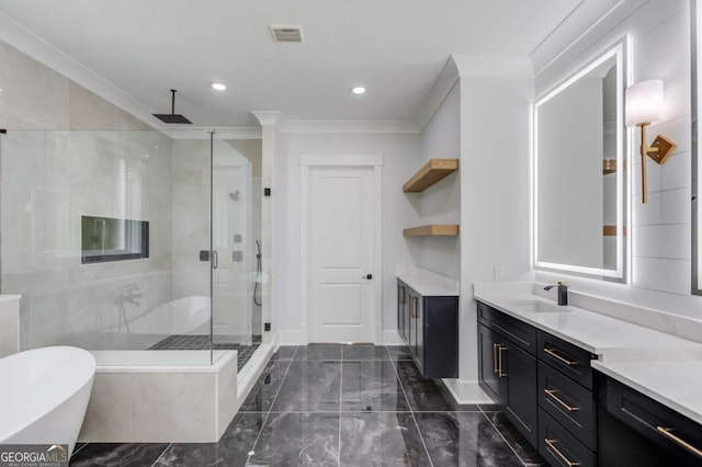 bathroom with plus walk in shower, vanity, and crown molding