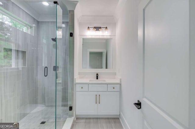 bathroom with vanity and walk in shower