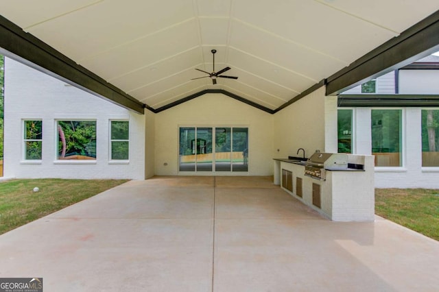 view of patio / terrace featuring an outdoor kitchen, a grill, and ceiling fan