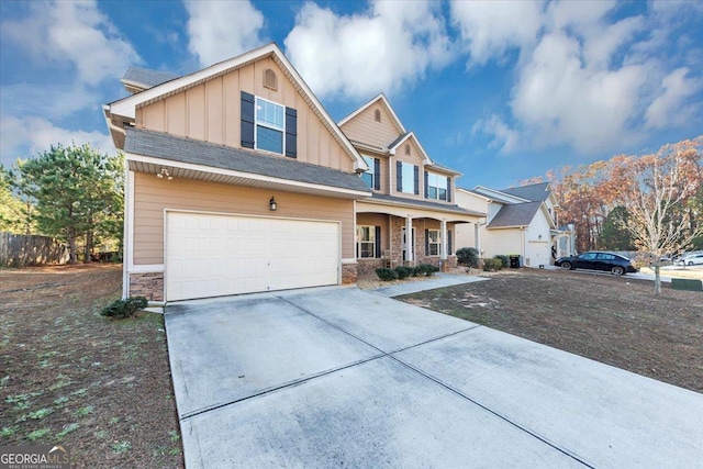 view of front of house with a porch and a garage