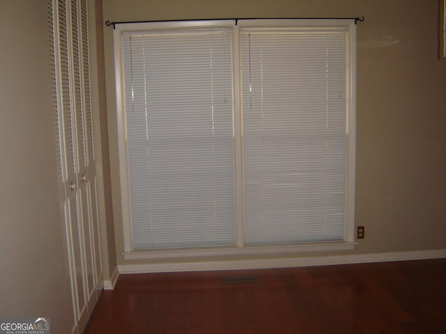 interior details featuring hardwood / wood-style floors