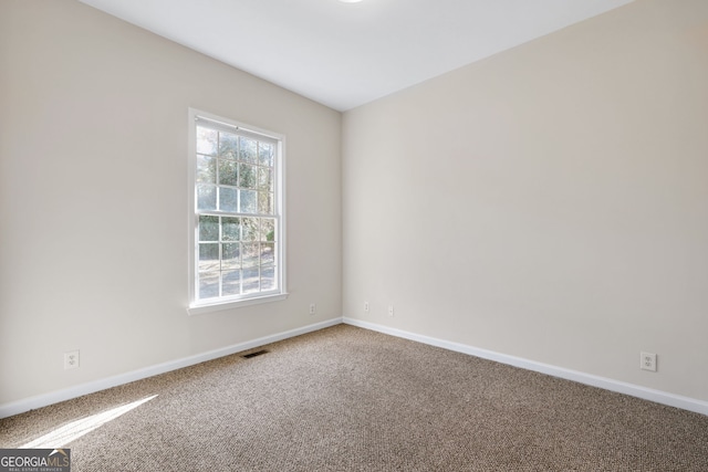 view of carpeted spare room