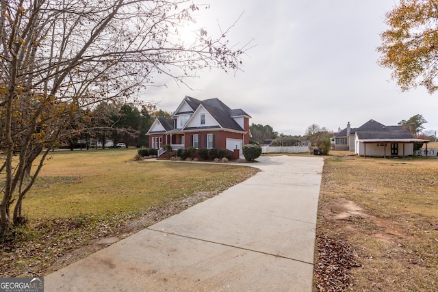 exterior space featuring a garage and a front lawn