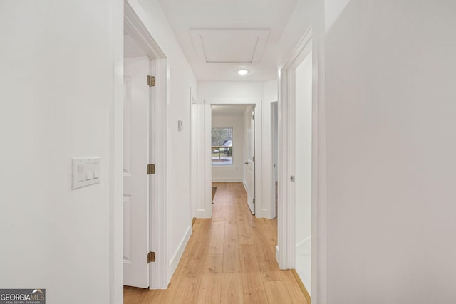 hallway with light wood-type flooring