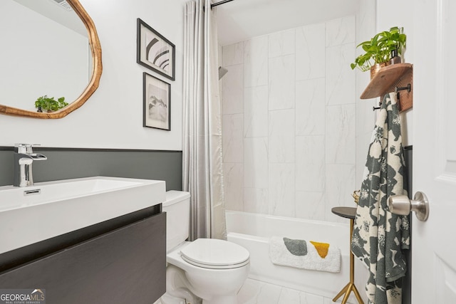 full bathroom featuring vanity, toilet, and shower / bath combo with shower curtain