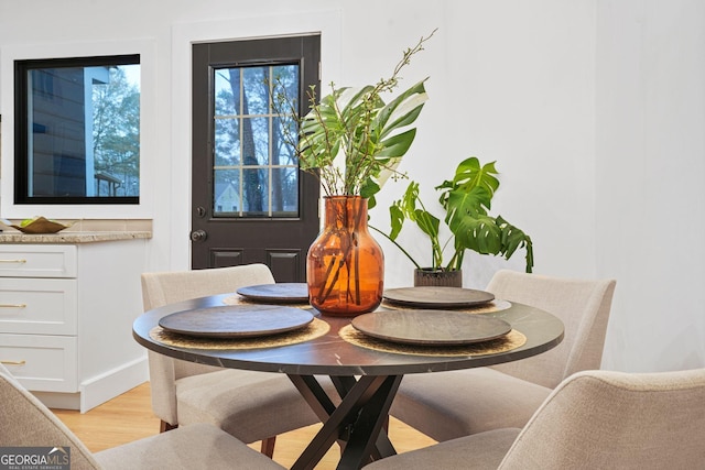 dining space featuring light hardwood / wood-style flooring