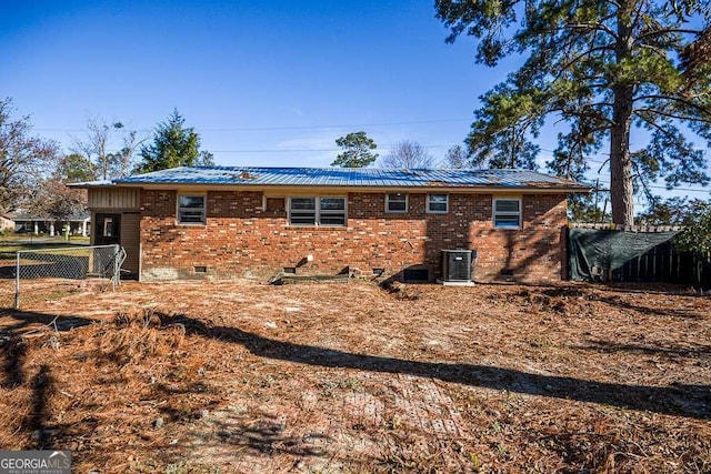 back of property with central air condition unit