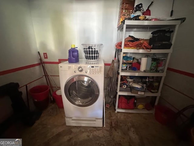 washroom with washer / clothes dryer