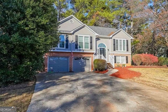 bi-level home featuring a garage