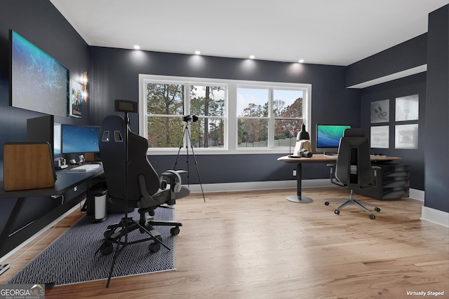 office area with light wood-type flooring