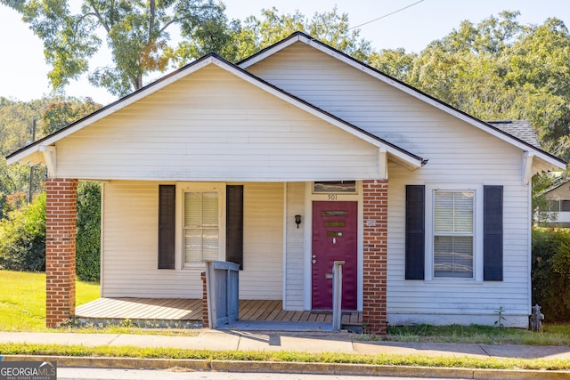 bungalow-style home with a porch