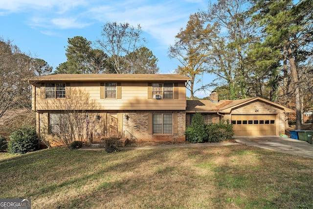 view of property with a front yard and a garage