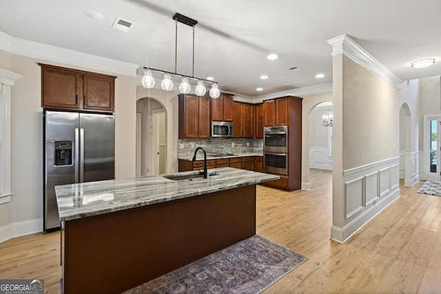 unfurnished dining area with light wood-type flooring and ornamental molding