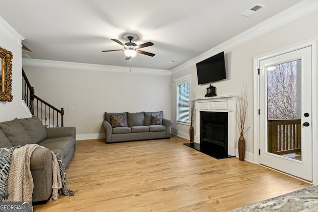 unfurnished dining area featuring hardwood / wood-style flooring, a notable chandelier, beam ceiling, and ornamental molding