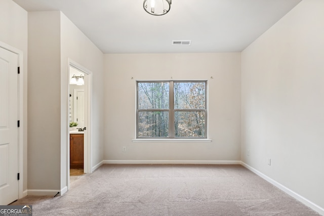 kitchen with stainless steel dishwasher, ceiling fan, light stone counters, and crown molding