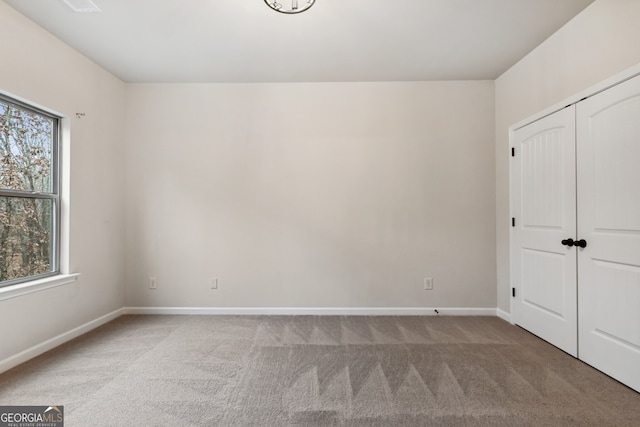 kitchen featuring sink, light wood-type flooring, stainless steel appliances, and a wealth of natural light