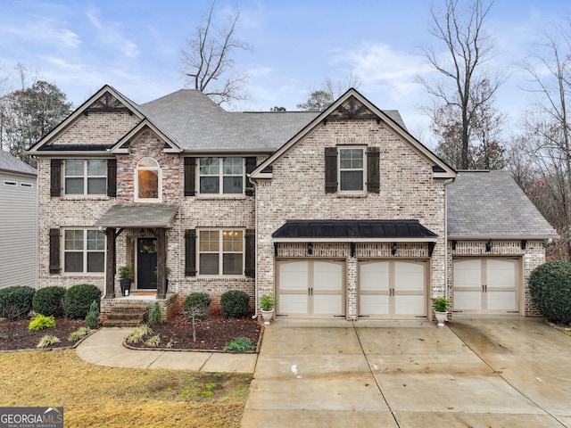 craftsman-style home with a garage