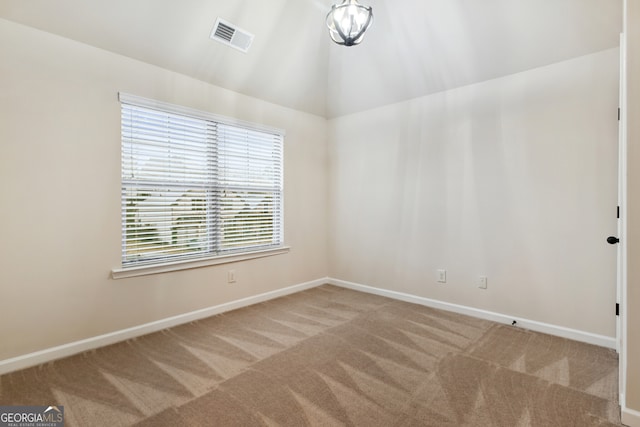 doorway featuring dark tile patterned flooring