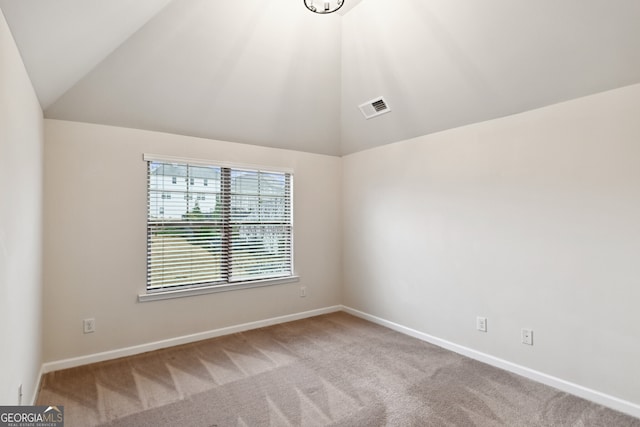 unfurnished bedroom with carpet, a closet, and multiple windows