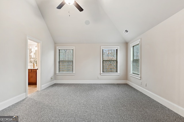 stairway featuring carpet, vaulted ceiling, and ornamental molding