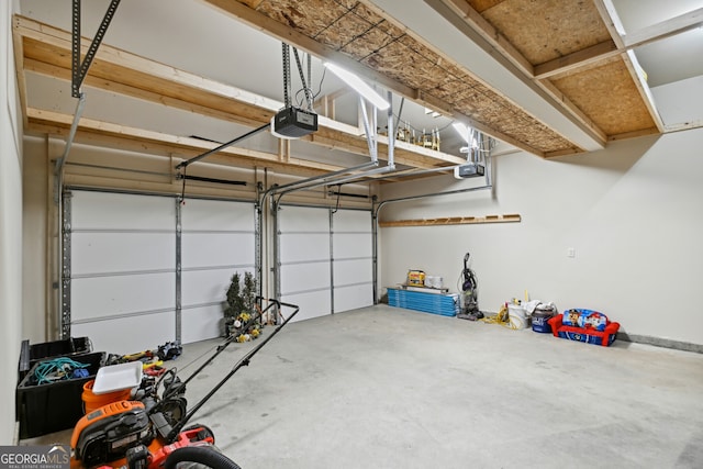 garage featuring a garage door opener