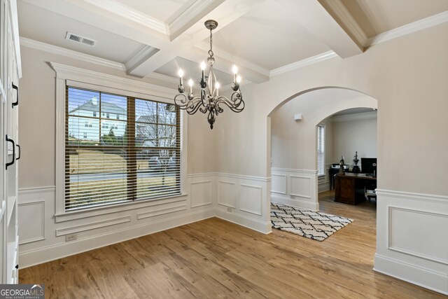 entryway featuring light wood-type flooring and ornamental molding