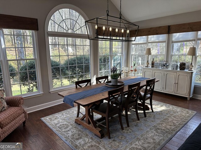 carpeted bedroom featuring a tray ceiling, ceiling fan, a fireplace, and ornamental molding