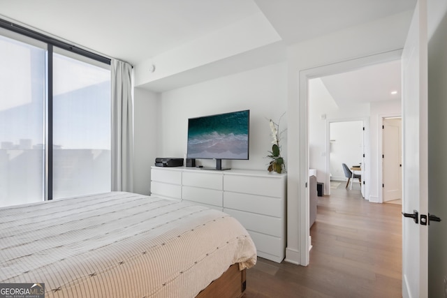 bedroom featuring hardwood / wood-style floors