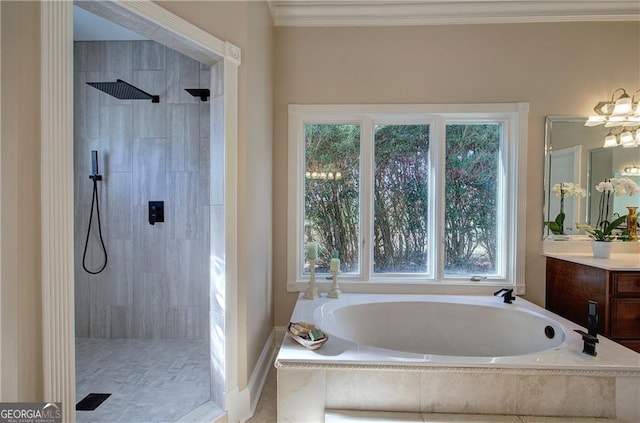 bathroom featuring vanity, crown molding, and shower with separate bathtub