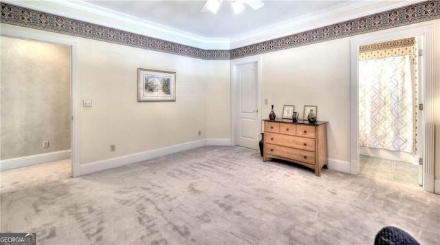 bedroom with ceiling fan, crown molding, and carpet