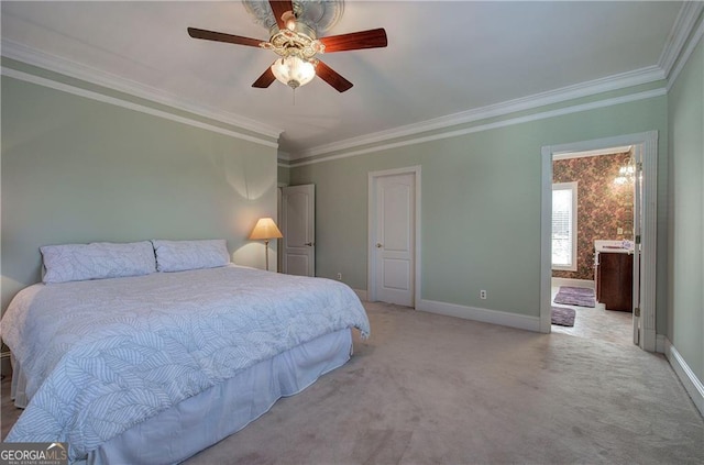 bedroom with connected bathroom, ceiling fan, crown molding, and light colored carpet