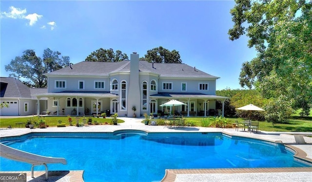 rear view of house with a patio area