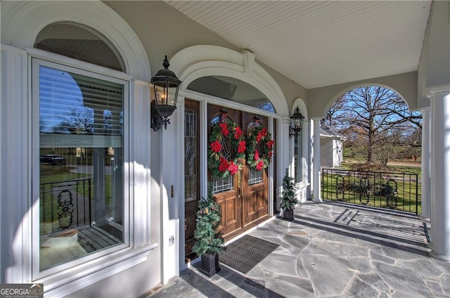 entrance to property with a porch