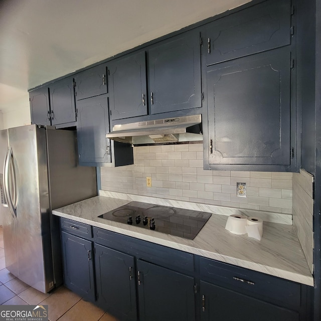 kitchen featuring light tile patterned flooring, black electric stovetop, stainless steel fridge with ice dispenser, and backsplash