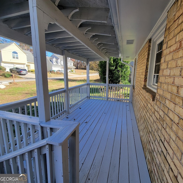 wooden deck featuring a porch