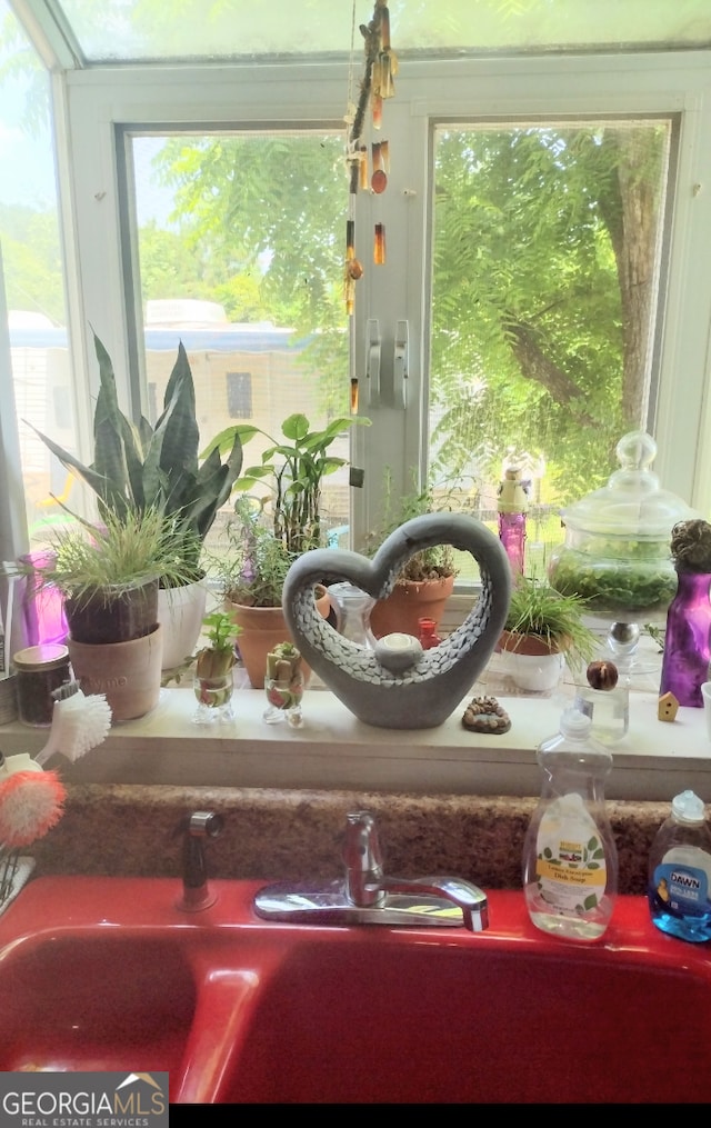 sunroom with sink