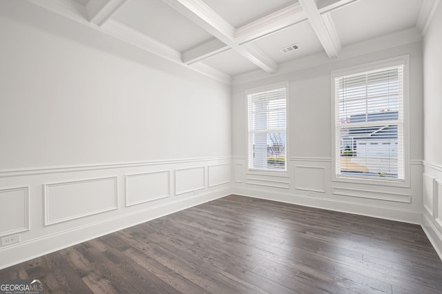 empty room with crown molding, dark hardwood / wood-style flooring, beamed ceiling, and coffered ceiling