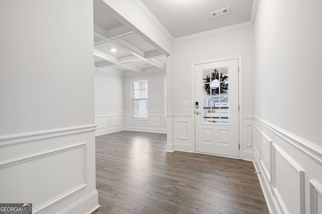 interior space featuring crown molding, beamed ceiling, dark wood-type flooring, and coffered ceiling