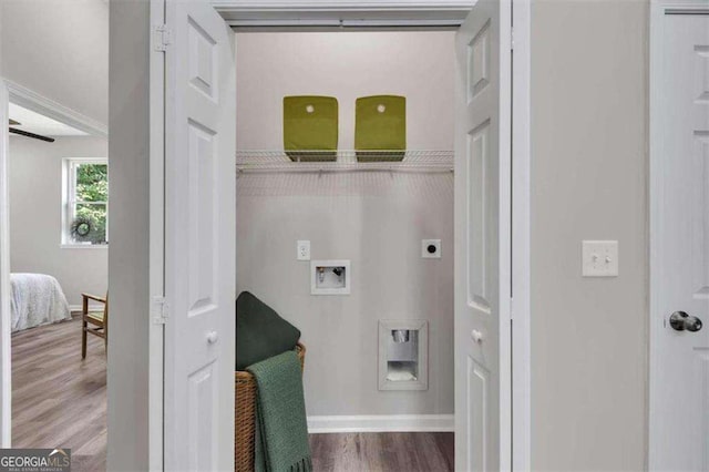 washroom featuring hardwood / wood-style floors, electric dryer hookup, and washer hookup