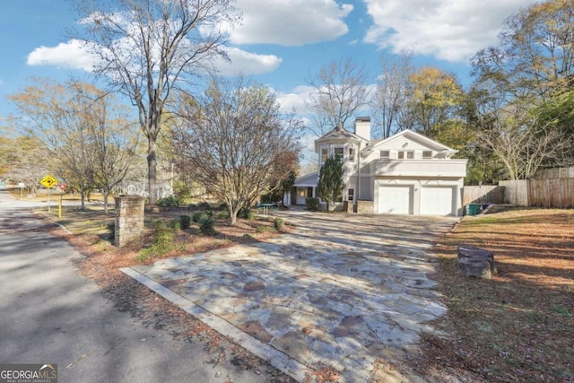 view of property exterior featuring a garage