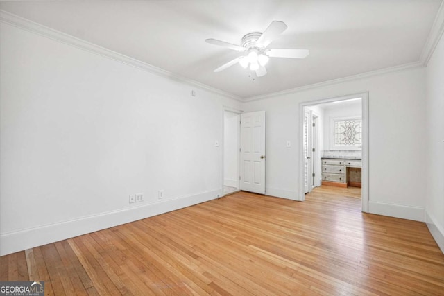 unfurnished bedroom featuring crown molding, connected bathroom, ceiling fan, and light hardwood / wood-style flooring