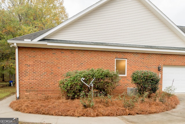 view of home's exterior with a garage