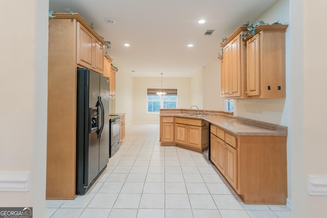 kitchen featuring kitchen peninsula, light brown cabinetry, sink, black appliances, and pendant lighting