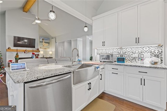 kitchen with vaulted ceiling with beams, light hardwood / wood-style flooring, white cabinets, and stainless steel dishwasher