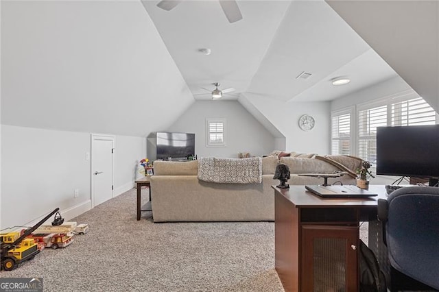 carpeted office featuring ceiling fan and lofted ceiling